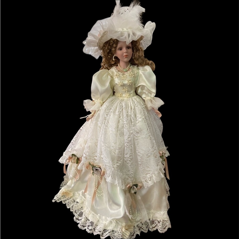 26” Century Collection Gibson 2002 doll. Porcelain head, arms and legs.